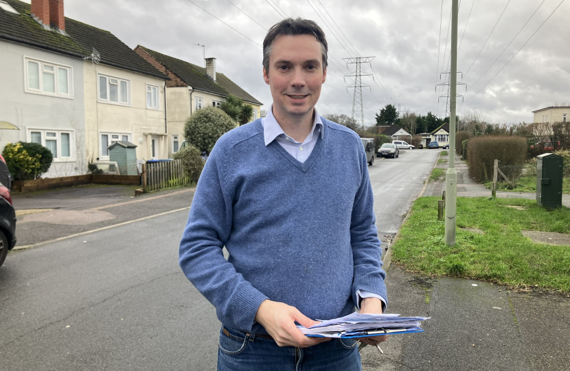 Runnymede Borough Council leader Cllr Tom Gracey